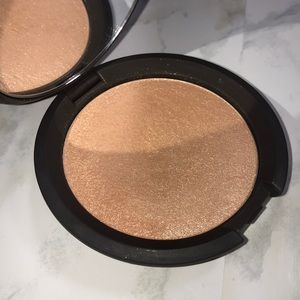 BECCA Cosmetics “champagne pop”